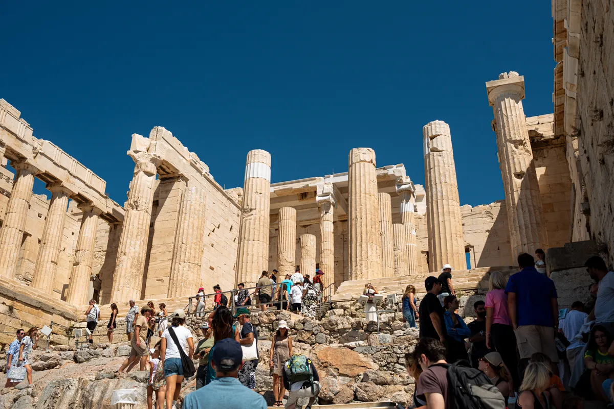 Students among the columns of the Propylaea on the Acropolis
